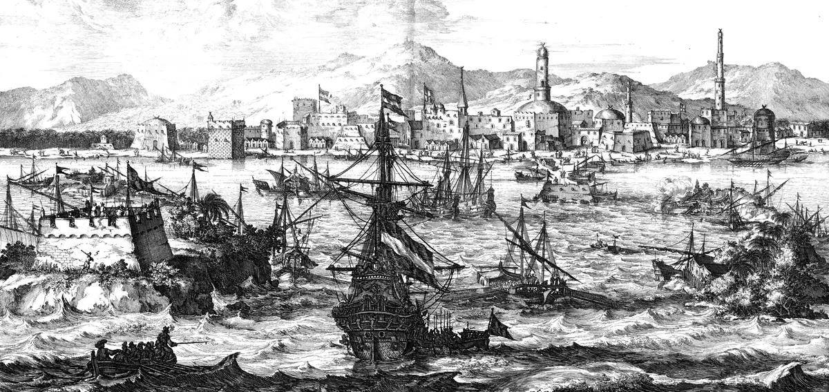 An engraving of the port of Mocha: sailing ships crowd the harbour, the walled town and its minarets stand behind, mountains beyond.